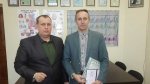 С фон Миллером А.А. Вручение сертификата.